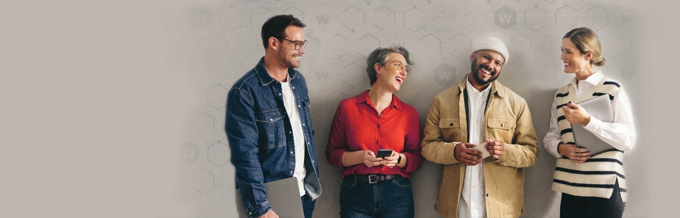 4 diverse people laughing together