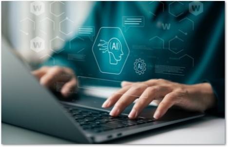 hands on a laptop with icons floating between the screen and the user